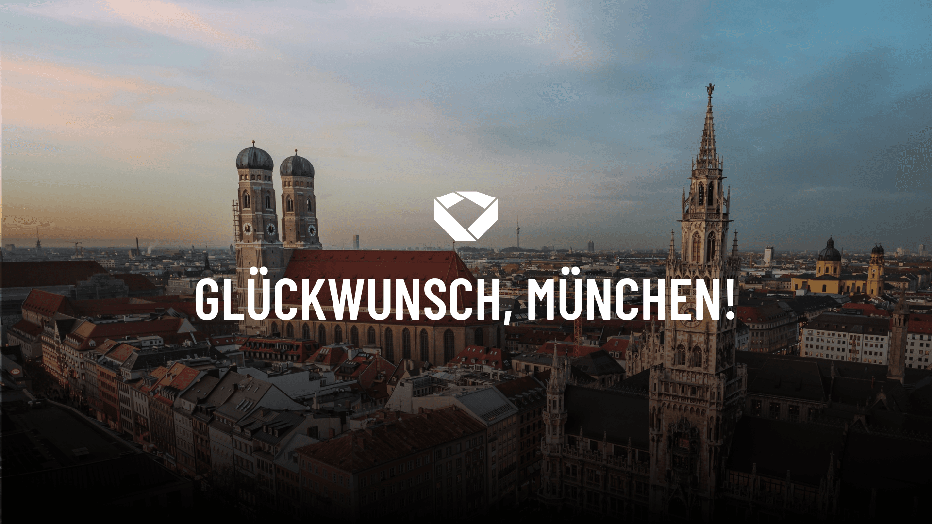 Ein Blick auf München mit Frauenkirchen und Marienplatz.
